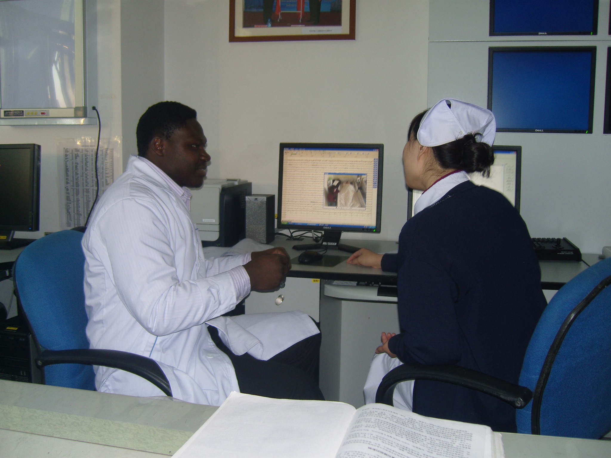 Clinician seated at a computer